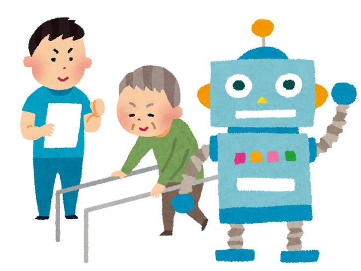 介護ロボットを活用したリハビリに励むおじいさんと見守る理学療法士の男性