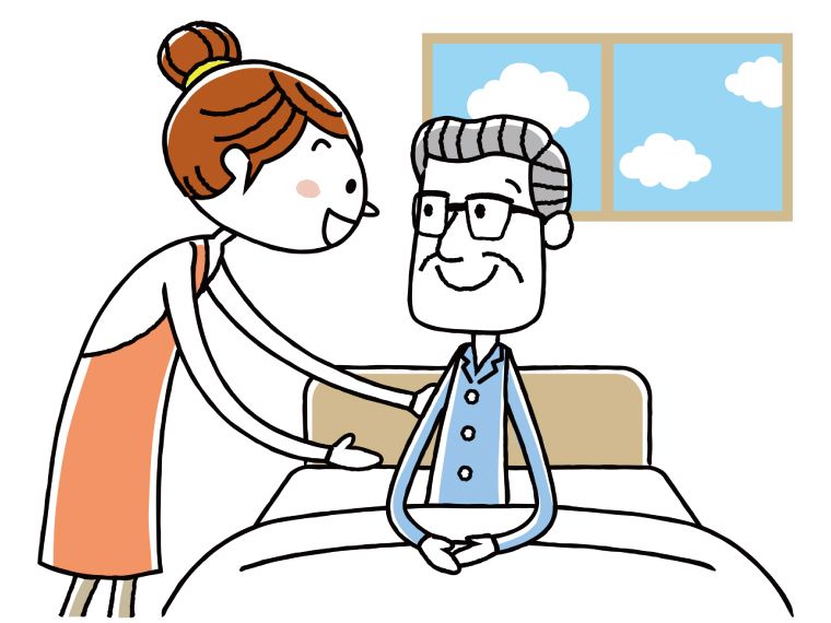 ベッドに座る高齢者と若い女性