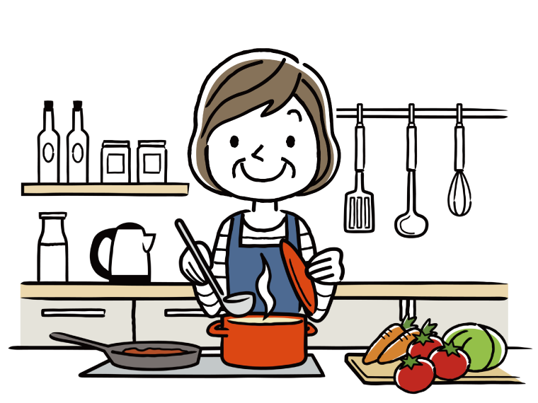 わくわくしながら料理をする高齢女性