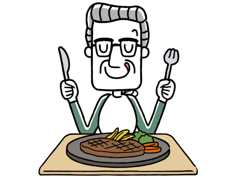 ステーキを食べようとする高齢男性