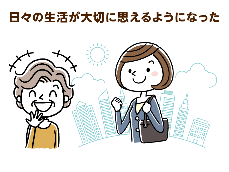 ガッツポーズをした女性と笑顔の高齢女性