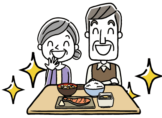 食欲に直結する見た目の良い介護食を笑顔で見つめる老人の男女