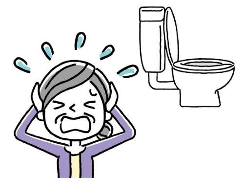 トイレのことを考えて頭を抱えて苦しむ高齢女性