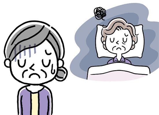 寝苦しくなっている高齢女性と、肩を落として落ち込む高齢女性