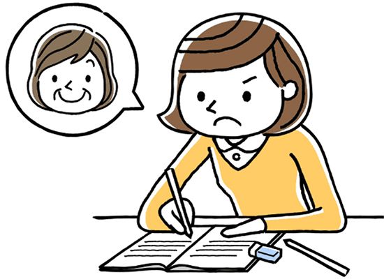 高齢の母のことを考えながらカタログをチェックする若い女性