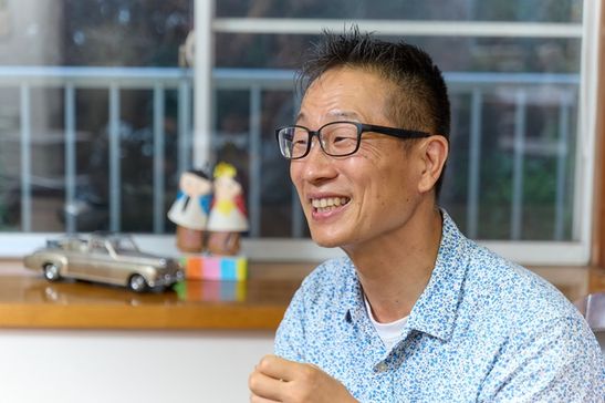 取材に答える谷本氏