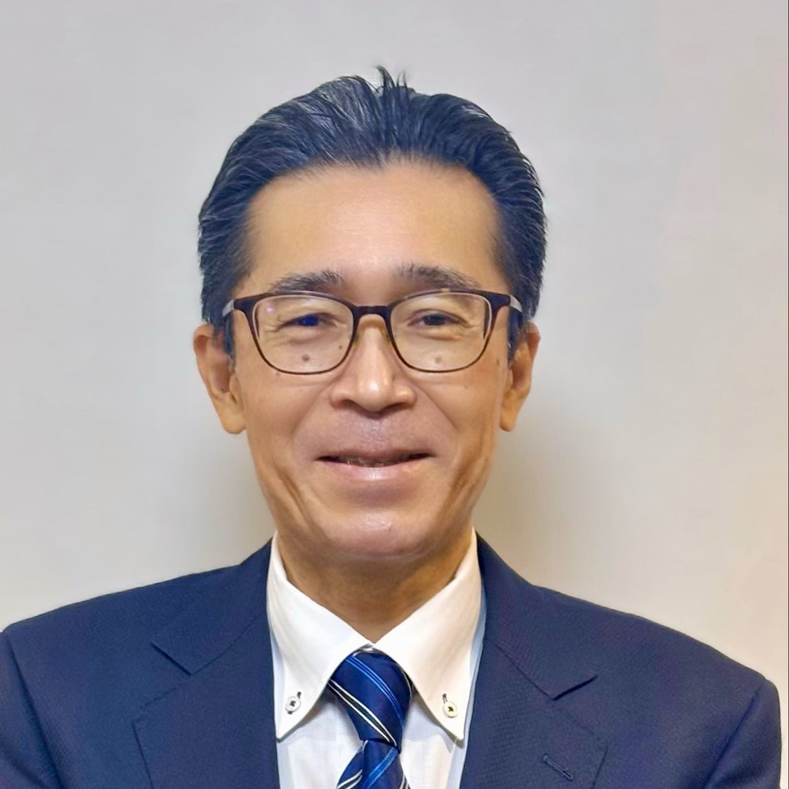 本間 哲男