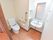 個室のトイレは洗面台と一緒になっており、出入り口の扉は引き戸になっている。トイレには手すりがあり、車椅子で入っても余裕がある、