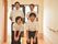 ガラス張りのドアと窓から明るい日差しが入っている廊下。そこにスタッフが並んでいる写真。男性が3名と、女性が1名。