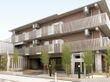 ３階建てのダークグレーがおしゃれな建物である。周辺には植え込みがあり、手入れが行き届いている。夜になるとライトアップされる。