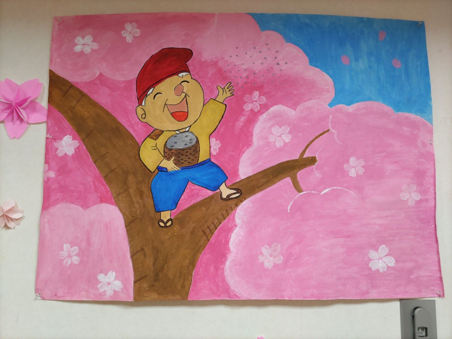 桜と笑顔の壁画