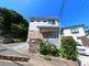 明るい住宅地にある介護施設