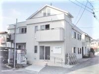 通常の２階建て住宅のような外観のグループホームおもとの郷東本郷