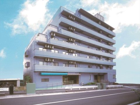 「ニチイホーム 立川柴崎」の外観。スタイリッシュなデザインの建物。