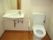 ニチイケアセンター旭川北の居室トイレ。居室内に設けられた個人専用のトイレとなっております。手すりが完備されており、お気軽にお使いいただけます。