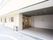 「プラチナ・シニアホーム宝塚逆瀬川」の外観。各居室にベランダを設置し4階建ての、施設外観になっている。