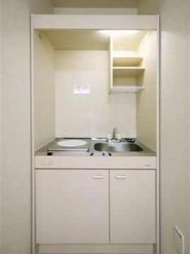清潔感のある居室のキッチン