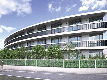 「アプルール材木座」の外観。植木鉢を設置し、緑を多く演出している。