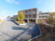 グループホームの周辺には視界を遮る建物はなく、見晴らしの良い立地となっている。また敷地内には遊歩道も用意されている。