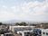 高さのある屋上からは、遠くの山々と青い空、雲、電線、下の方には家々や会社などが見渡せ大変景色が良い。