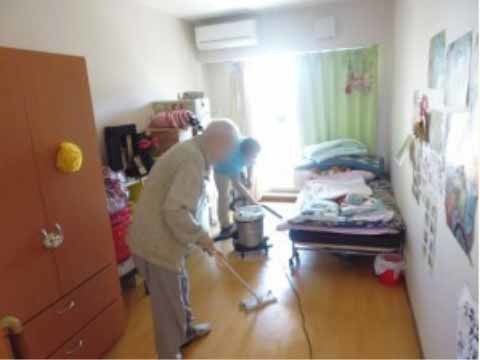 「グループホーム町屋あやめ」の外観。周辺地域に馴染むような落ち着いたデザイン。