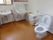 トイレは車椅子でのご利用が可能な広々としたスペースがあり、手すりやオストメイトを設置するなど入居者様が使いやすいよう機能性を備えている。
