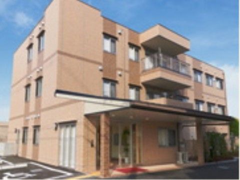 「ここから木田元宮」の外観。落ち着いたレンガ造りの建物。