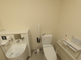 手すり付きのトイレスペース