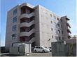 「よろこびの家 栄」の外観。津軽海峡沿いに位置する5階建てのグループホームになっている。