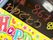 誕生日のお祝い。スタッフからの心のこもったプレゼント。高齢者の方が読みやすいように、文字の大きさや背景の色、文字の色を工夫している。