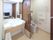 「杉戸ケアコミュニティそよ風」の洗面台・トイレ。洗面台とトイレは隣接し使いやすくしている。