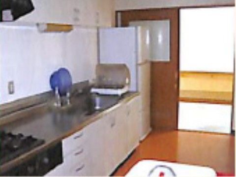 キッチンのイメージ画像。食事の準備は、入居者様と作業をしながら自然に行えるリハビリに最適の場と言える。