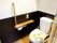 シャンティいなみⅡのトイレ。居室内のトイレにも手スリを設置。スライドのドアなので開け閉めが楽です。