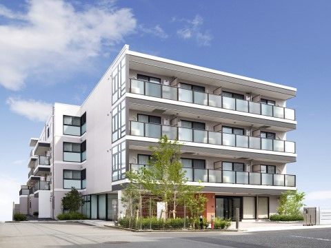 ベランダ付きの居室が並び、高級マンションのようにおしゃれなデザインの外観