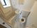 部屋にある浴室はお風呂と洗面台、トイレが一体となっている3点ユニットバス仕様となっている。お風呂側の壁には手すりがある。