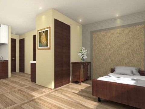 落ち着いた色調の建具があり、多くのダウンライトで照らされている居室