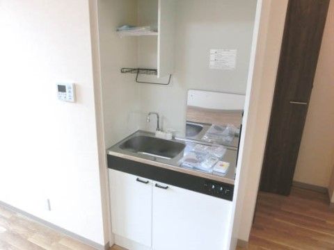 居室に用意されたミニキッチンでは、入居者様が自分で自分のお茶などを好きなときに用意する事ができ、自信向上にもつながる。