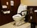 トイレもオーク調で統一している。座って左手には頑丈な手すりと右手には各種機能付きスイッチ、目立つところに呼び出しベルがついている。