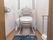 ウォシュレット付き洋式トイレが設置されてある。起ち居と助ける手すりが設置されてある。緊急ブザーも完備。