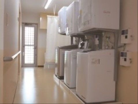 「サービス付高齢者住宅 カーサ・ラ・ヴィーダ川口 アネックス」の内観。洗濯室。