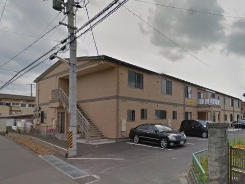 非常階段が設置されている、２階建てのグループホーム