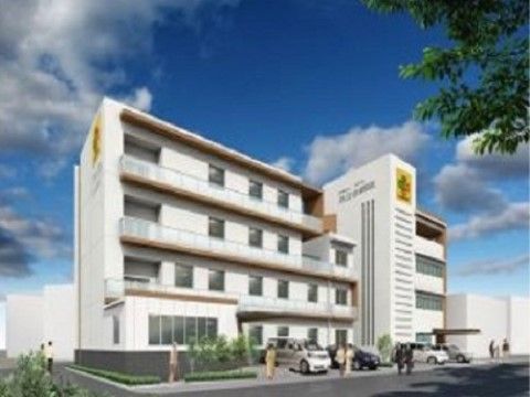 広大な敷地に建つ施設。病院、訪問介護事業所が併設されている。建物のまわりには緑が植えられ、さわやかな雰囲気である。