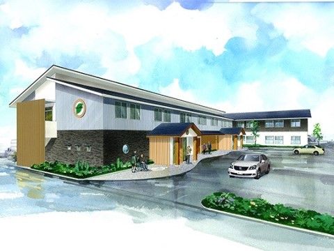 駐車場の広い介護施設の外観