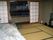 畳敷きの部屋には障子が設置された大きな窓があり、寝具が設置されている。床の間もある。