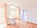 1LDKのAタイプの部屋には、キッチンとリビングダイニング、その奥には洋室といった間取りになっている。