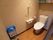 温水洗浄器付きのトイレがある。手すりやナースコールが設置され、入居者様がひとりでも安全に利用できるよう配慮されている。