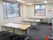 採光に配慮した設計である。縦長の広いテーブル、椅子が設置されている。自由にご利用いただけるスペースである。