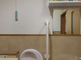 介護施設の清潔なトイレと廊下