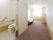 各居室内にはトイレがある。引き戸で開けやすい。個室内は方向転換しやすいように、ゆとりのあるスペースを確保している。