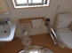 明るい個室のトイレと洗面所
